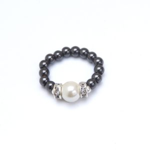 black beaded stretch ring with white accent bead