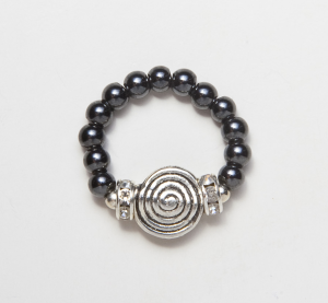 black beaded stretch ring with metal spiral accent bead