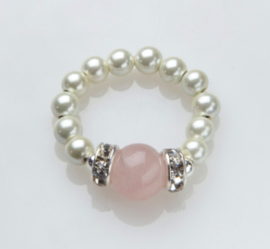white beaded stretch ring with rose quartz accent ball